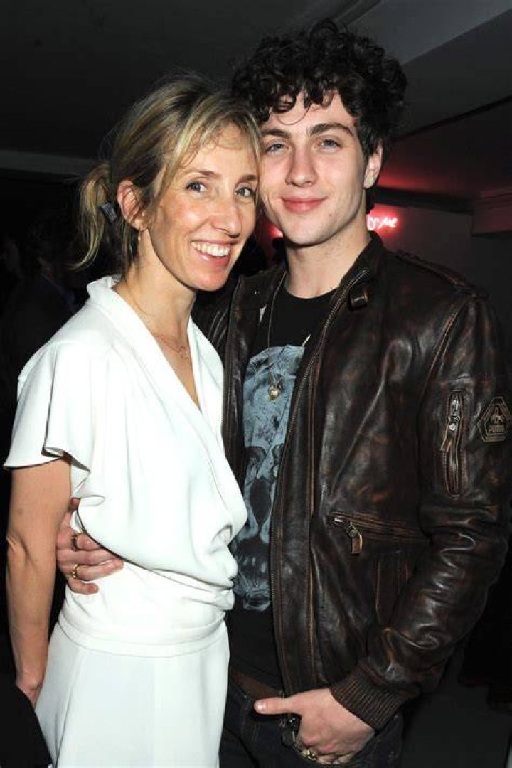 Aaron TaylorJohnson, 31, passionately kisses wife Sam, 54, in vow