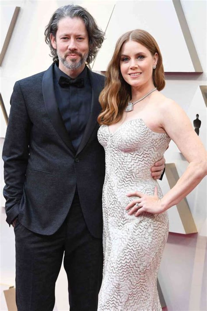 Amy Adams and her partner Darren Le Gallo seen their fitness gear