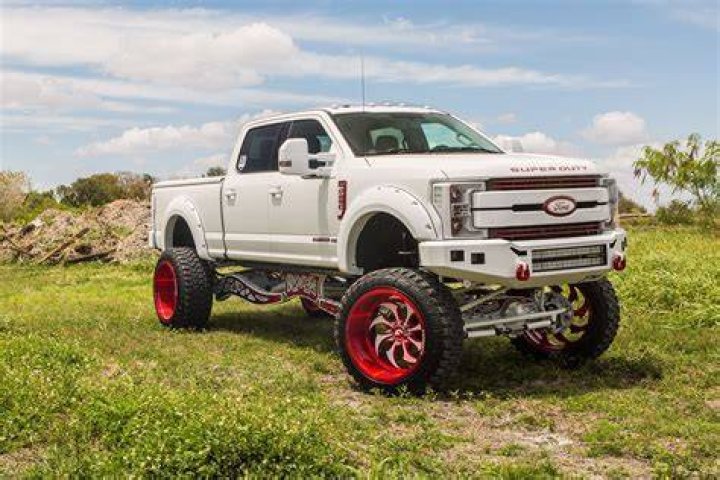 Extravagant Custom White Lifted Ford F250 Super Duty on Unique Rims