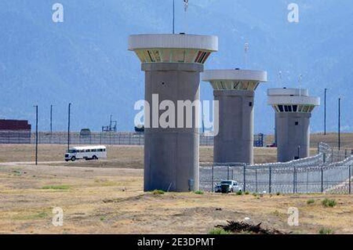 Guard towers surround the federal penitentiary facility known as