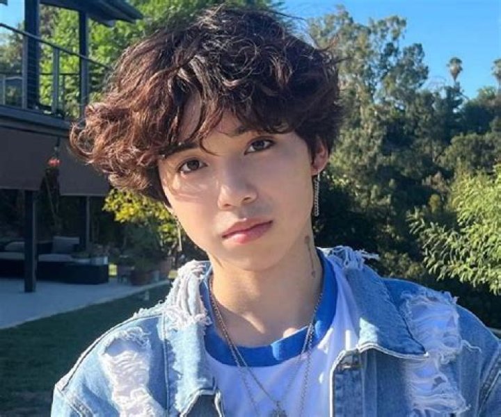 How old is Asher Lara? Where did he move back to?