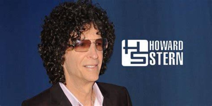 Howard Stern's wife Beth Ostrosky flashes tummy at husband's 60th