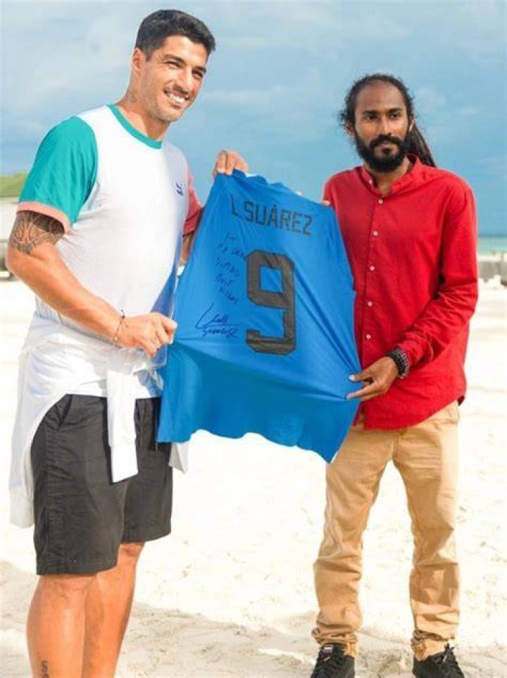 Luis Suarez enjoys luxury Maldives holiday with wife and three kids as