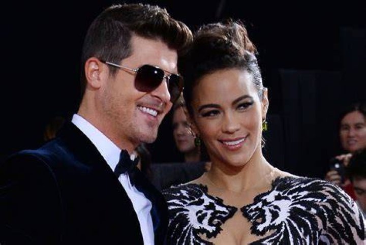 Paula Patton split from Robin Thicke over &lsquo;affair with woman they were