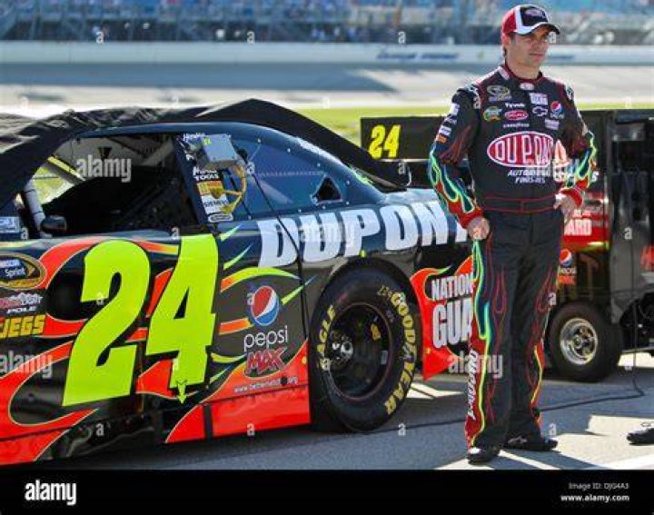 Photo Jeff Gordon and his wife Brooke share a lighter moment just