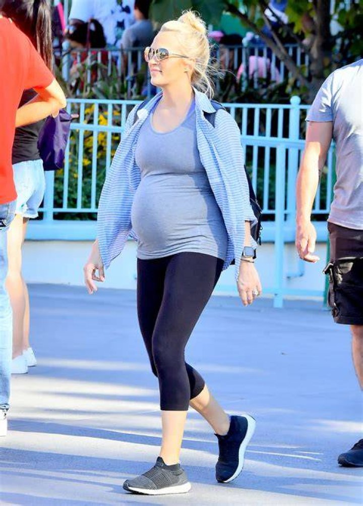 Pregnant Carrie Underwood Shows Off Bare Baby Bump with Son
