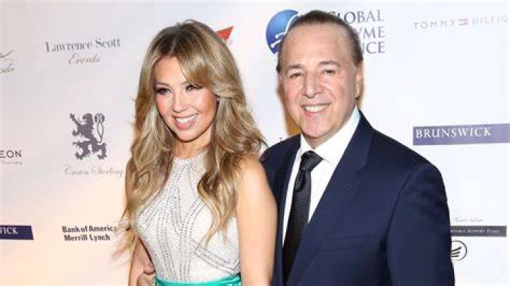 Tommy Mottola gets fit, and Thalia is excited about his biceps! Photo 2